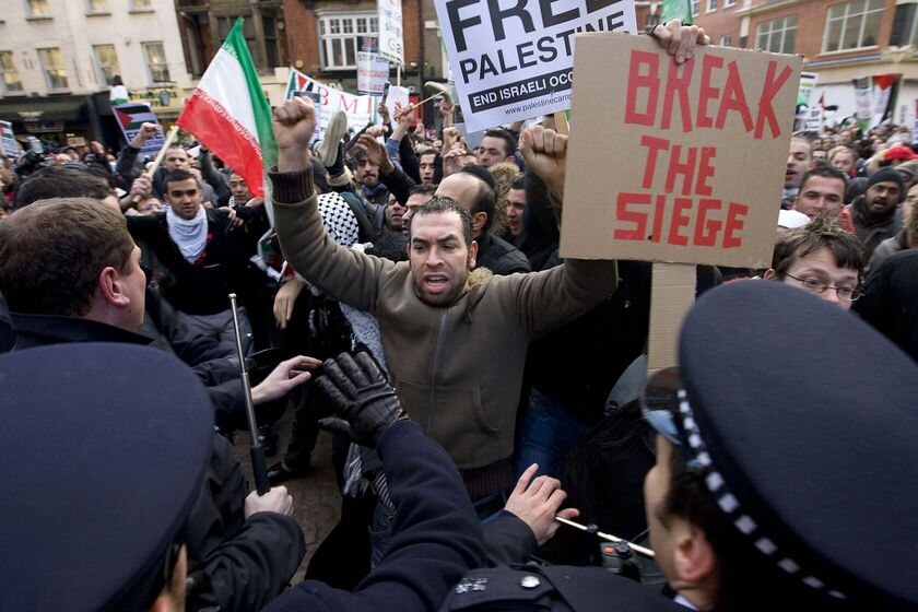 Protesters clash with police near the Israeli Embassy in central London (Ben Stansall: AFP)