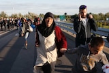 Asylum seekers on highway heading for Budapest