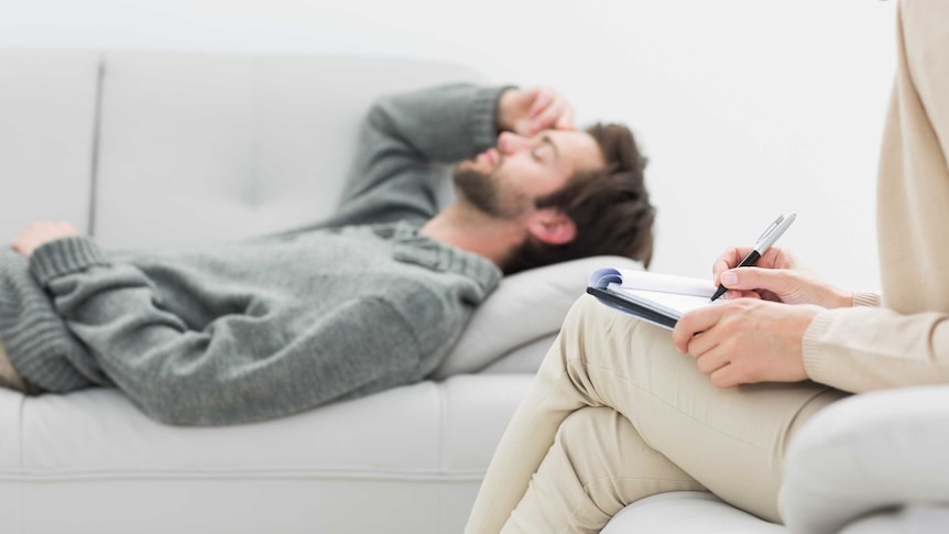 Man lying on couch