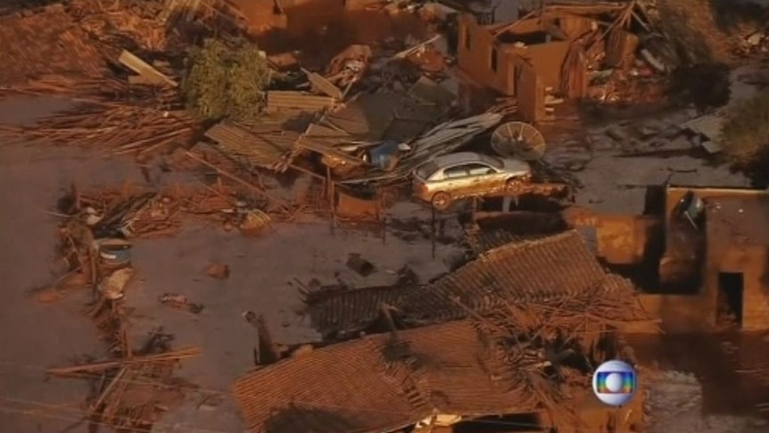 Brazilian mining dam floods neighbouring towns in mud