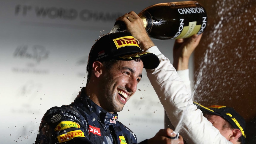 Second in Singapore ... Daniel Ricciardo celebrates on the podium