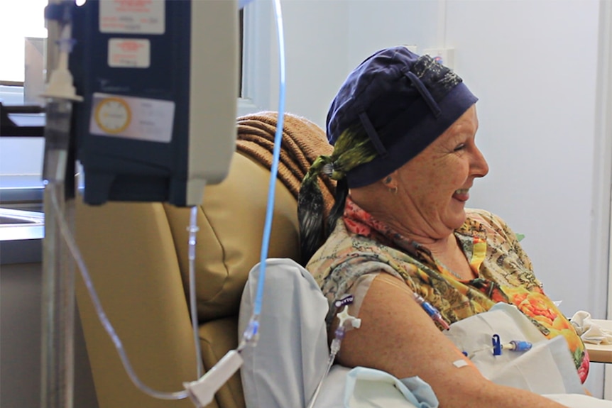 Jane Charuba being injected with chemotherapy drugs.