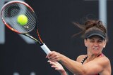 Casey Dellacqua plays a forehand against Karin Knapp at the Hobart International