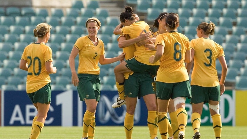 The Matildas celebrate a goal in a friendly against Italy in January 2009.