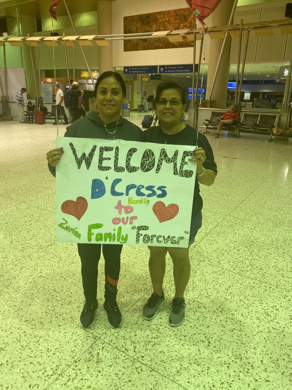 Rasmi (left) says meeting her family felt like finding the missing pieces.