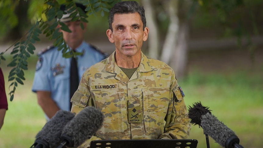 Major General Jake Ellwood speaking at a press conference.