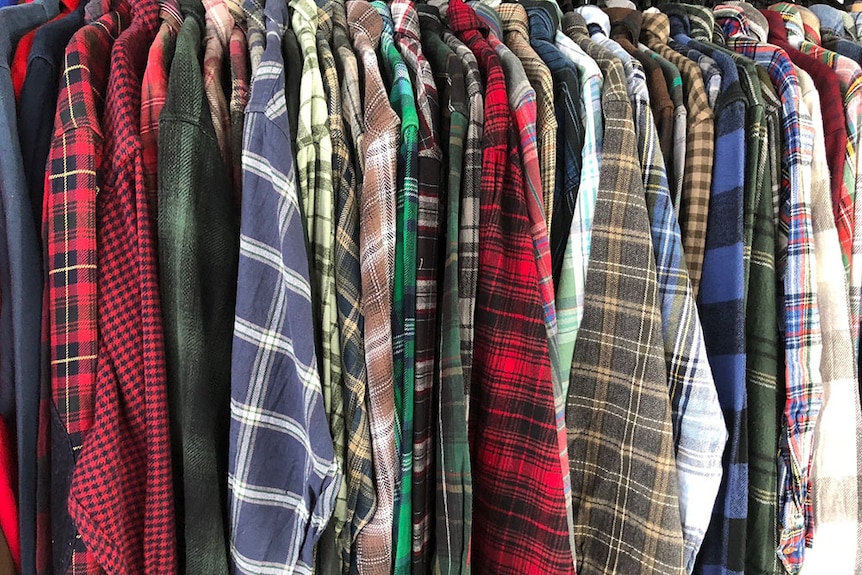 A rack of flannel shirts