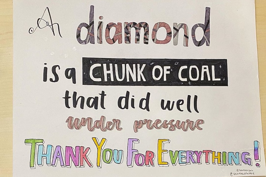 A handmade thank you card reading "a diamond is a chunk of coal that did well under pressure"