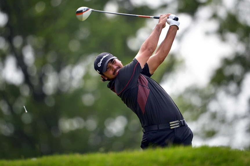 Jason Day hits a tee shot at the US Open.