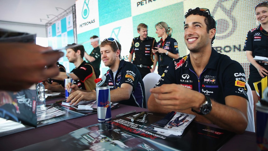 Red Bull's Sebastian Vettel (L) and Daniel Ricciardo (R) ahead of the Malaysian Grand Prix.