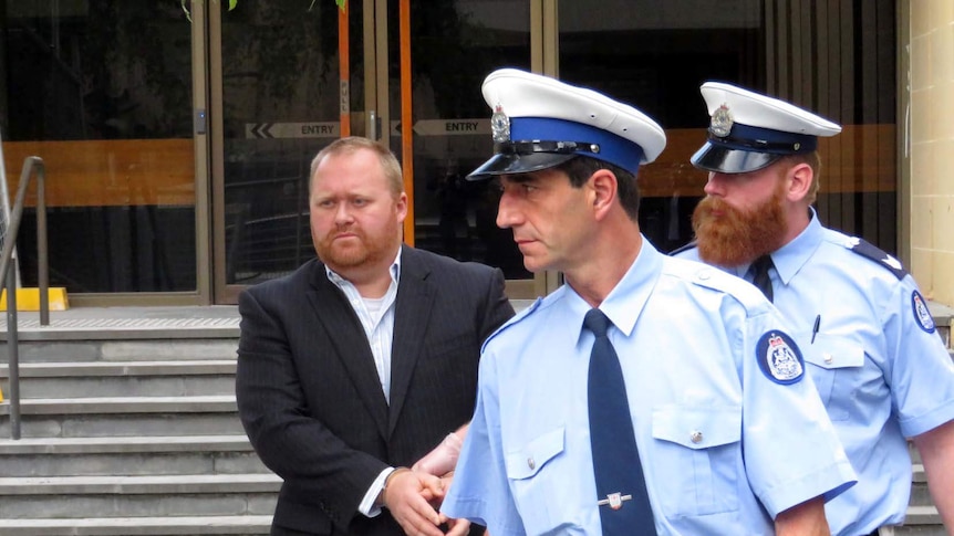 William Henry Richardson is led away by police.