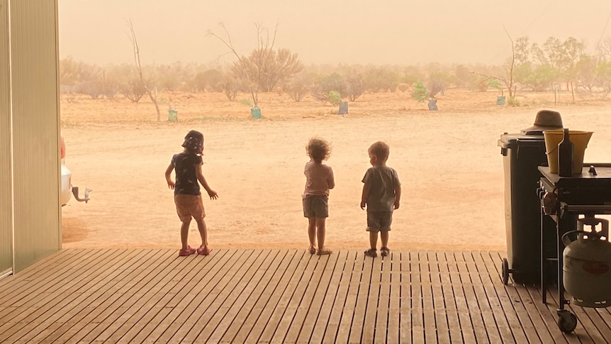 Children staring into the dusty abyss in Far West NSW