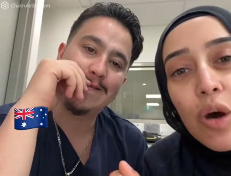 Image of two people claiming to be NSW Health workers, blurred, talking to a content creator that emerged