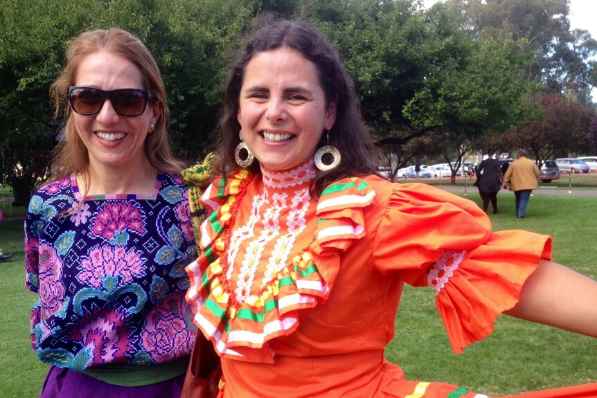 Maria White from Mexico and Andrea Arratia from Chile celebrate Harmony Day at Government House.