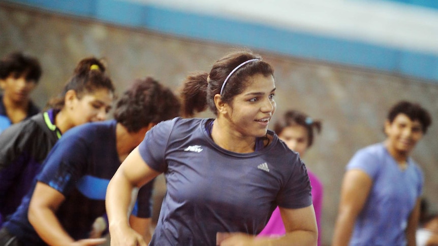 Indian wrestler Sakshi Malik takes part in a practice session at a Sports Authority of India gym.