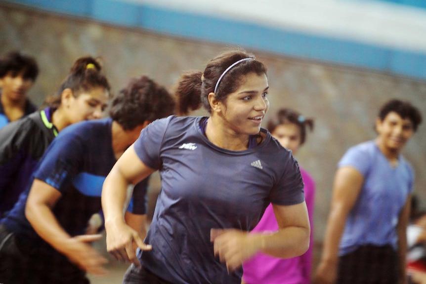 Indian wrestler Sakshi Malik takes part in a practice session at a Sports Authority of India gym.