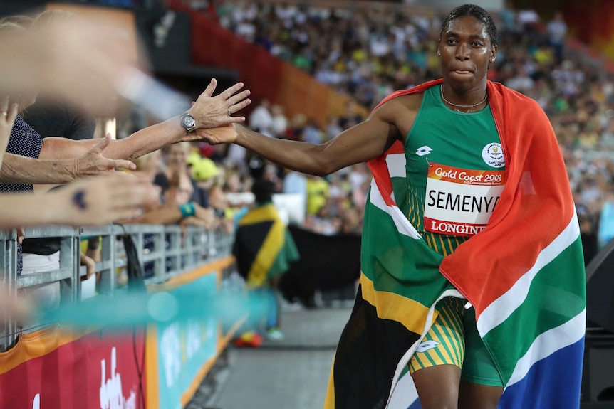 Caster Semenya celebrates with fans after winning the women's 800m