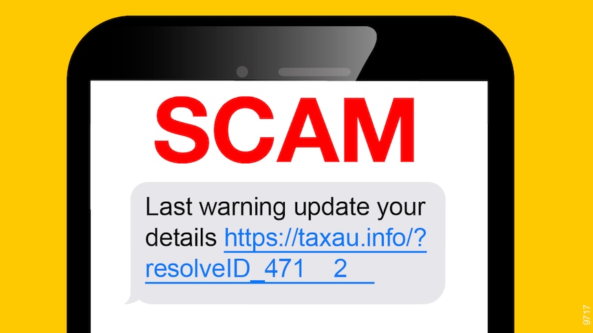A phone is seen against a yellow background with a text on it that reads: "Scam. Last warning update your details."