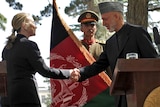 Hillary Clinton and Hamid Karzai