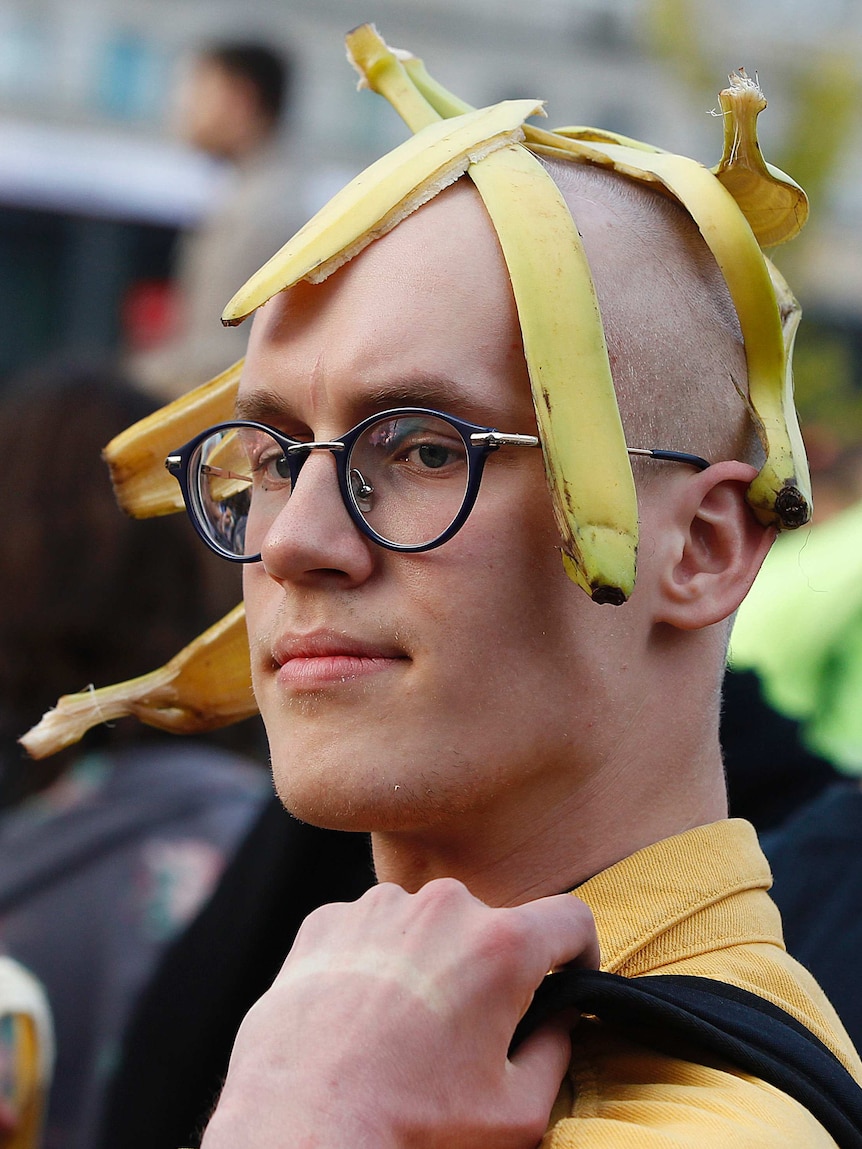 Man with banana peels on his head