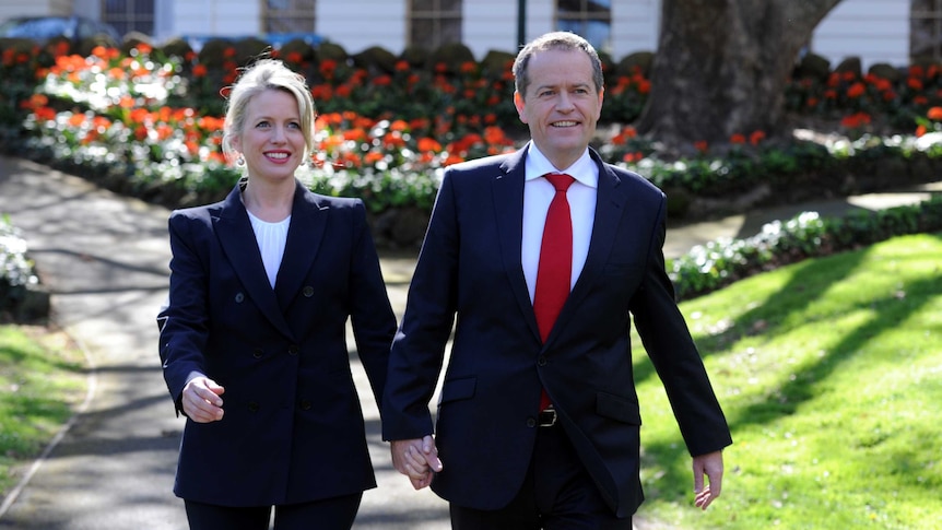 Bill Shorten walks with his wife after announcing leadership tilt