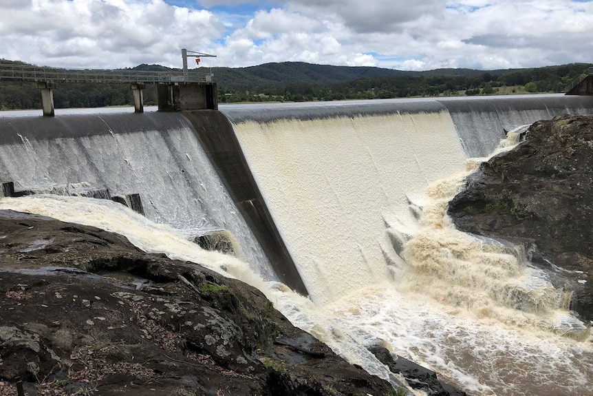 Water overflows at Wappa Dam at Yandina on Queensland's Sunshine Coast.