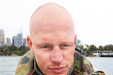 Navy clearance diver Paul de Gelder prepares to dive in a counter-terrorism exercise.