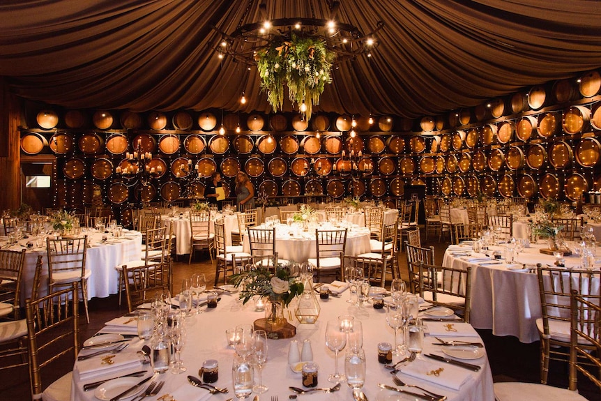 A lavishly decorated wedding reception dining room.