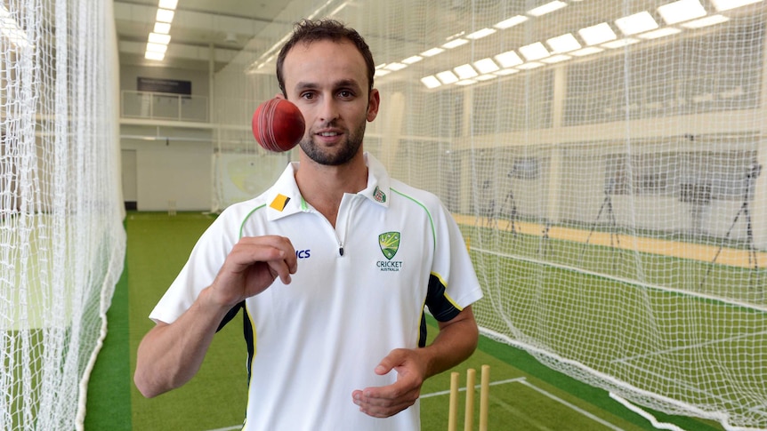Nathan Lyon poses at the new cricket high performance centre in Brisbane in November 2013.