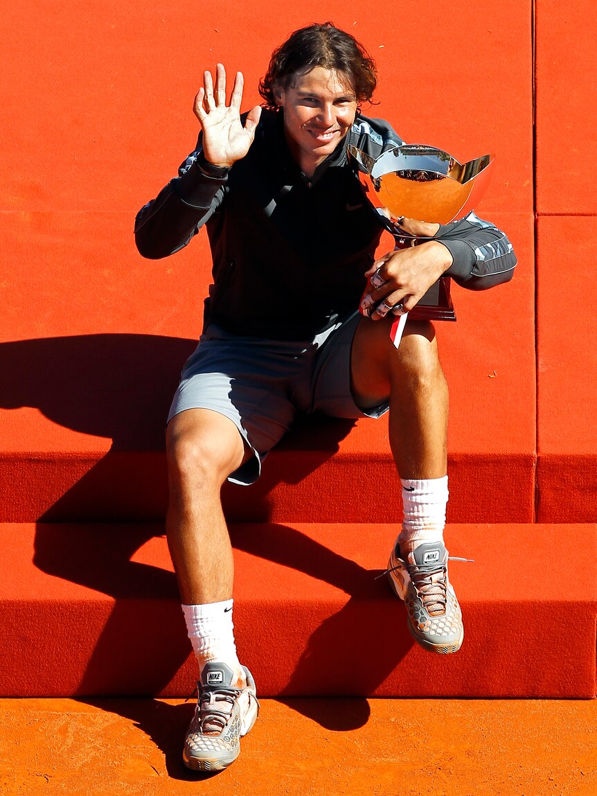 Nadal poses with his Monte Carlo trophy