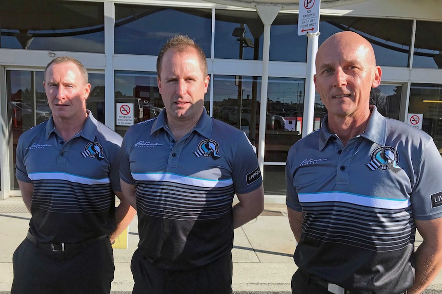 Devonport football club officials after meeting Gillon McLachlan.