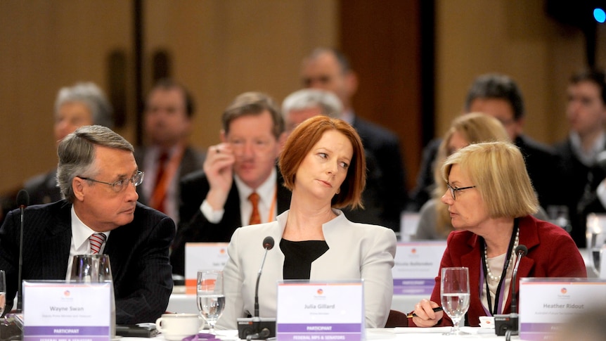 Wayne Swan and Julia Gillard listen to Heather Ridout