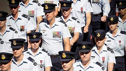 Combat Support Group members march through the streets of Brisbane during the 2013 Anzac Day Brisbane City march.