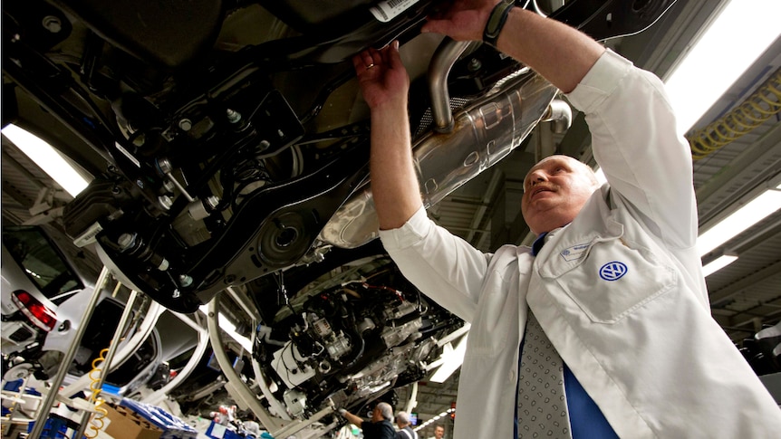 Volkswagen engineer working in the factory