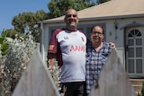 Peter Bates and Joanne Riley, aspiring foster carers, outside their Kalgoorlie home.