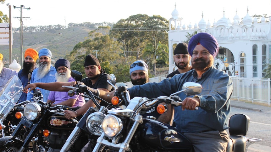 Members of the Sikh community in Woolgoolga campaigning for changes in motorbike helmet laws