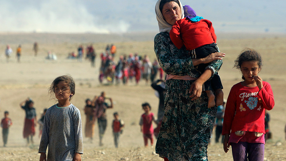 Displaced people from the minority Yazidi sect, fleeing violence from forces loyal to the Islamic State.