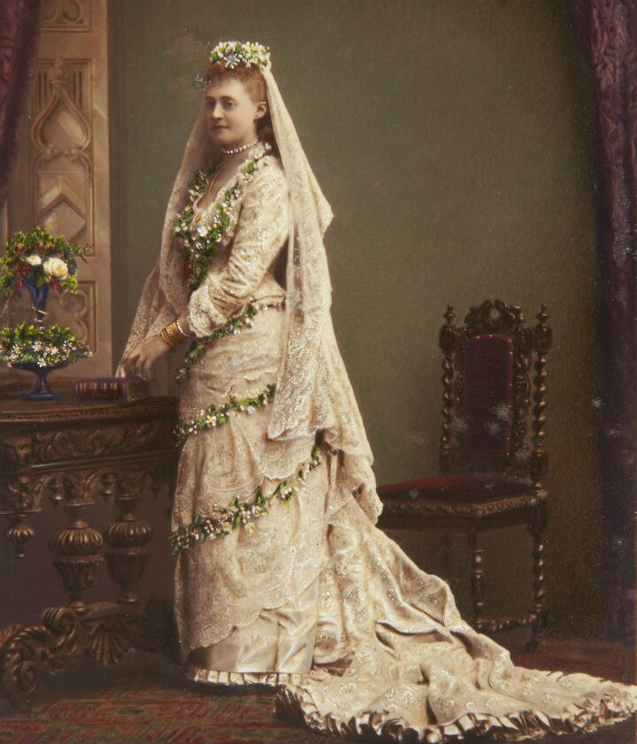 a bride festooned in garlands