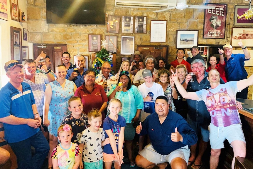 Crowd keeps cool on Christmas Eve inside the Birdsville pub on day it was 49.3 in the town.