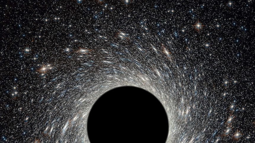 Black hole in space surrounded by stars.