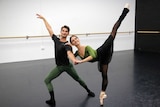 A male and female ballet dancer strike a pose.