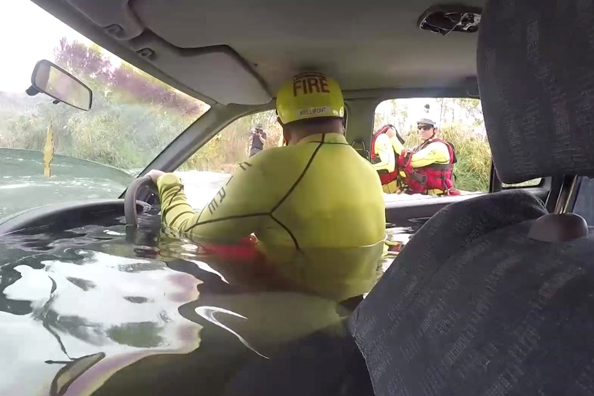 Inside a flooded car for swiftwater rescue training