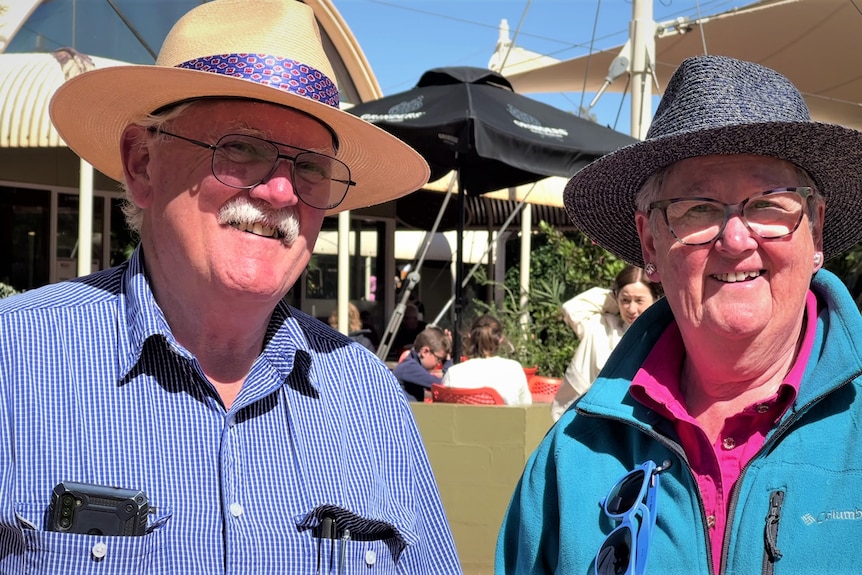 Two retirees at a resort.