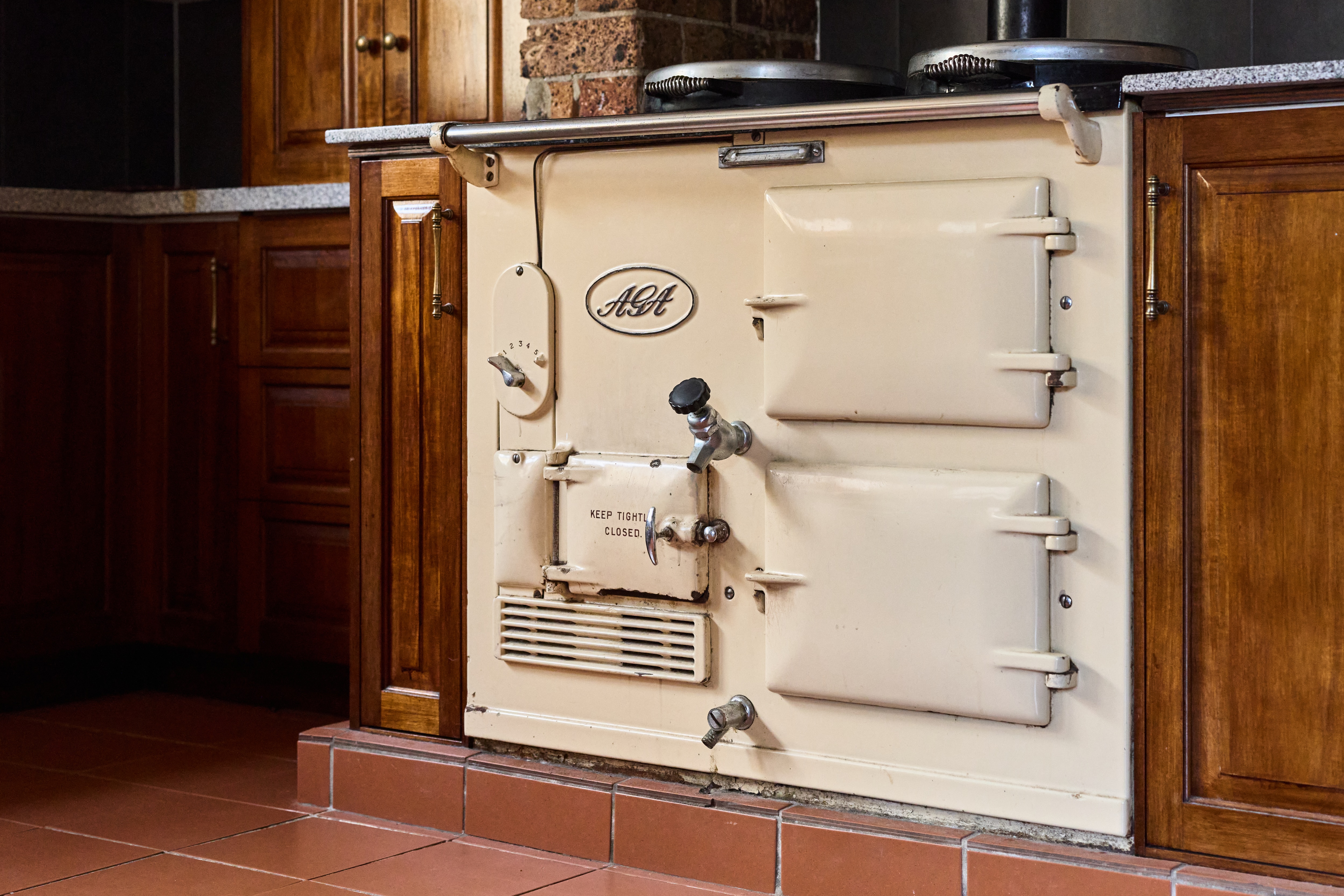 A heritage-listed home made of brick, with historic features throughout.