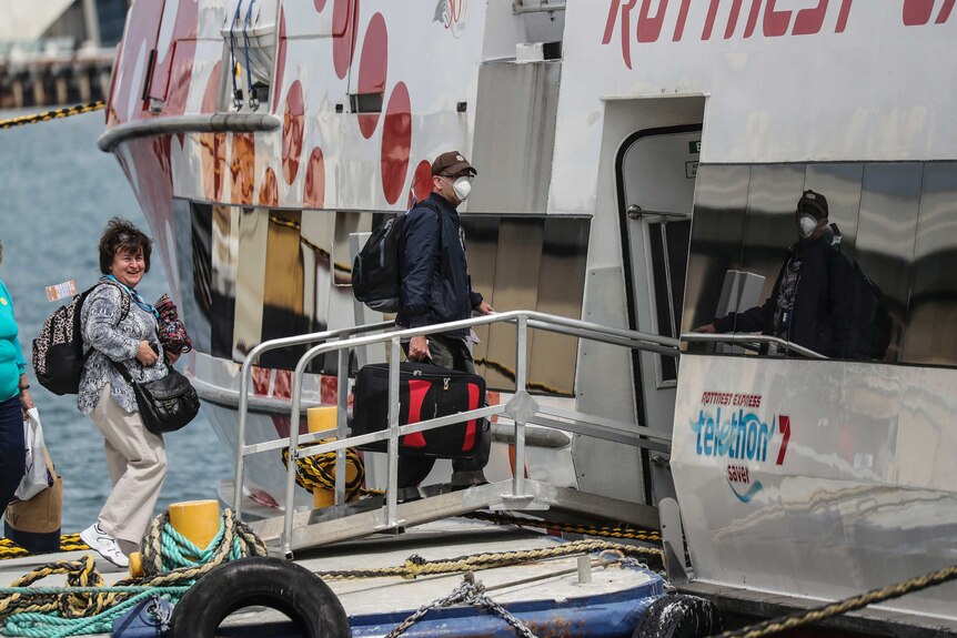 Passengers from Vasco Da Gama on gangplank to Rottnest ferry
