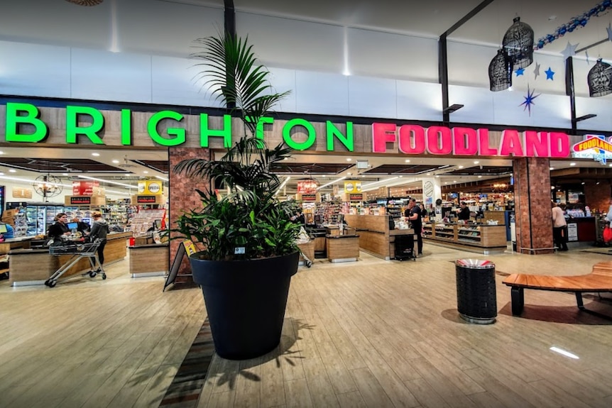 shopping centre foyer outside brighton foodland signage in green and red
