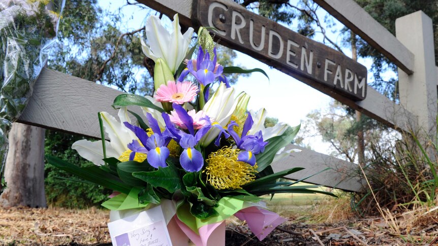 A floral tribute lies outside Cruden Farm.