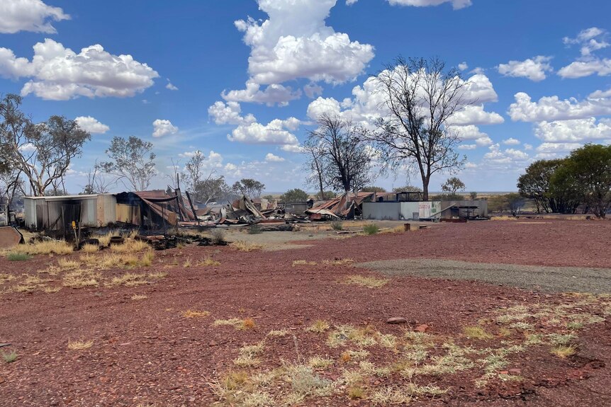 Several buildings destroyed by a fire in Wittenoom, smoke can still be seen.