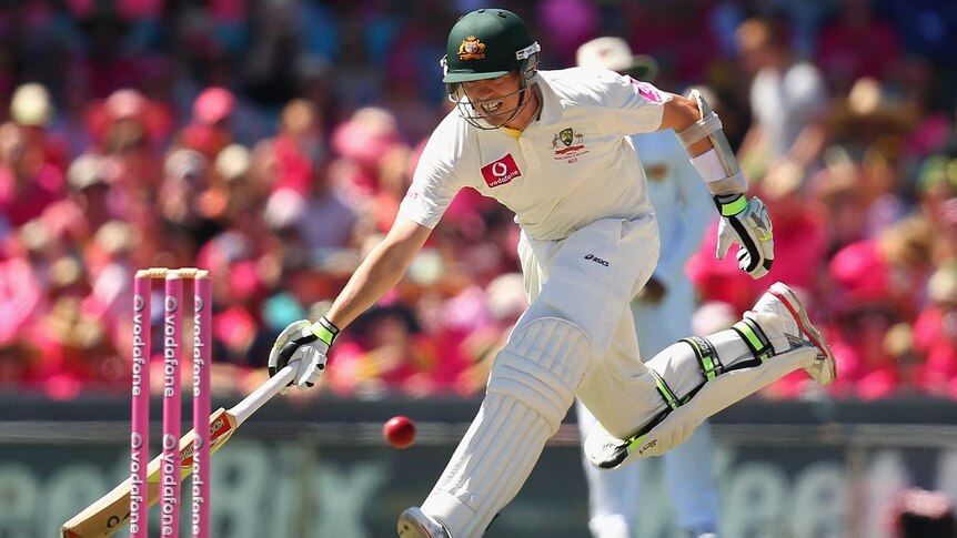 Scampering home ... Peter Siddle darts home to avoid a run-out early on day three.