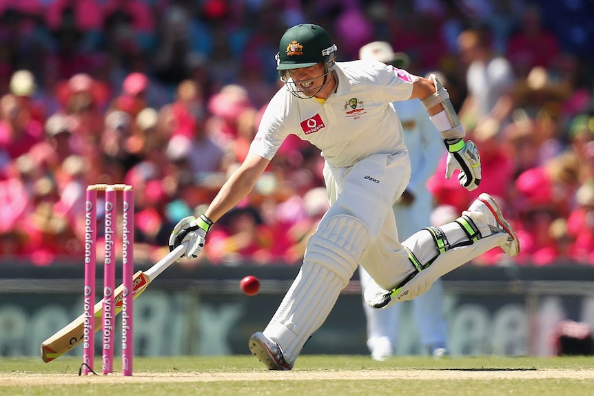 Scampering home ... Peter Siddle darts home to avoid a run-out early on day three.